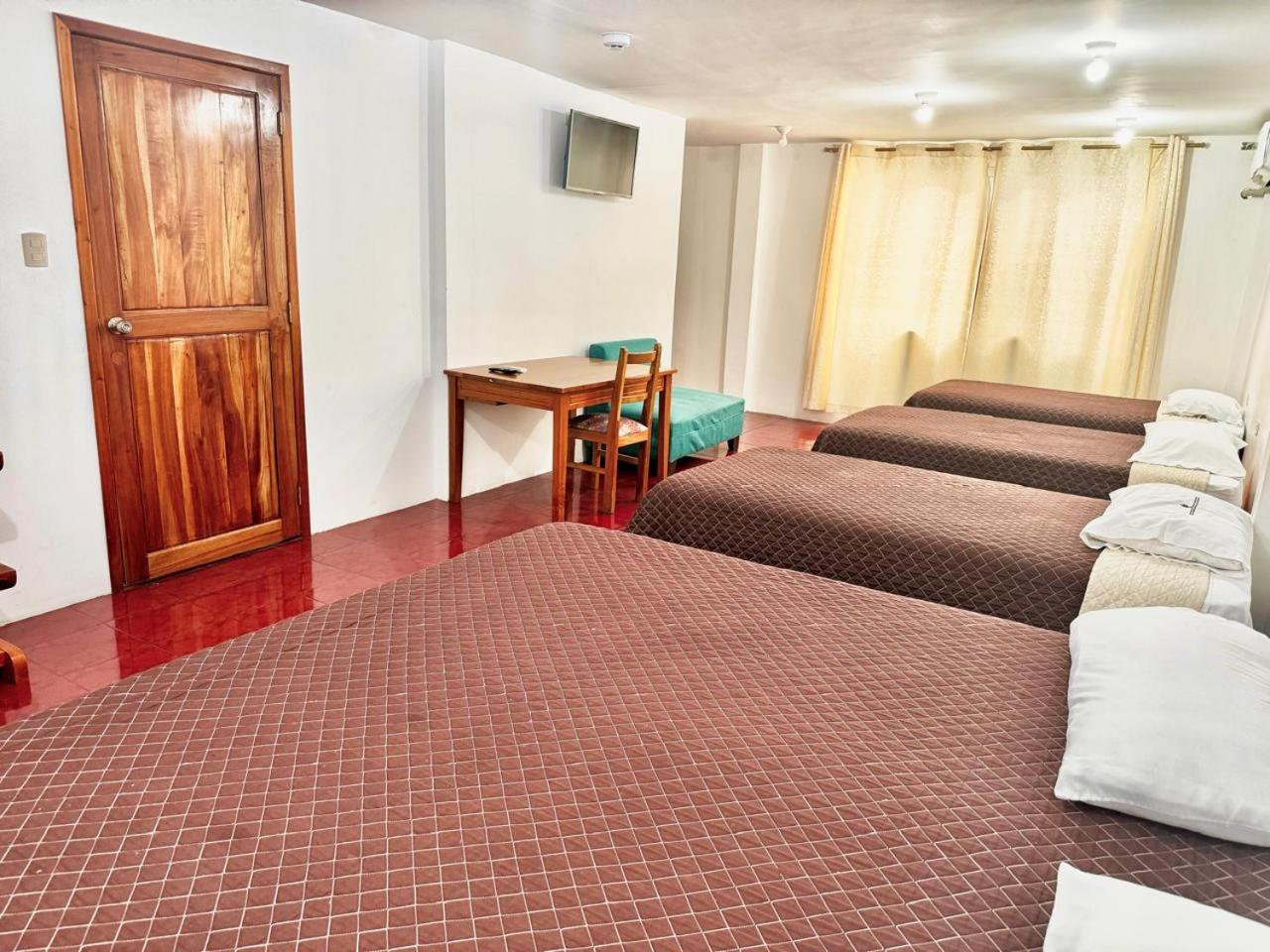 Hostal Muyuyo Пуэрто-Айора Экстерьер фото